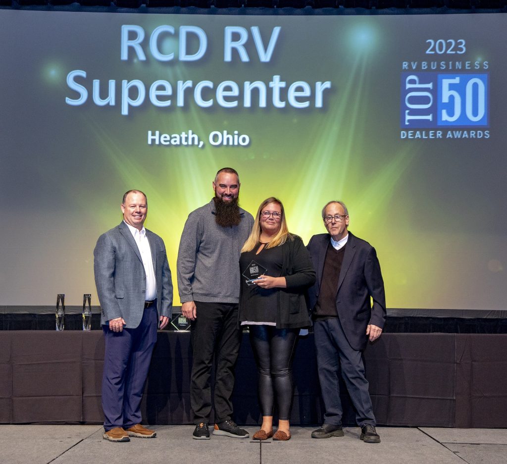 RCD RV accepting the RVBusiness Top 50 Dealer Award at RVDA 2023